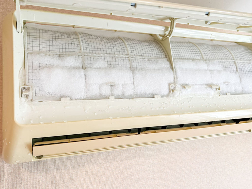 A frozen indoor air handler in a home.