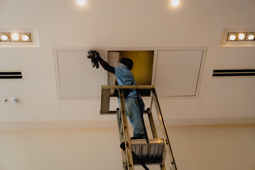 professional HVAC technician preparing for a central AC system replacement - how your old ac is removed and new system